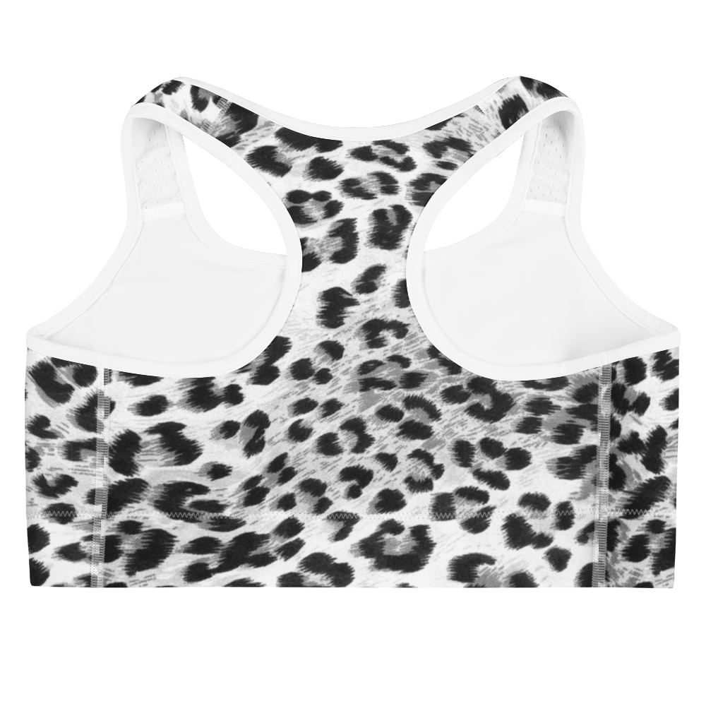 Leopard print sports bra with white trim on a white background