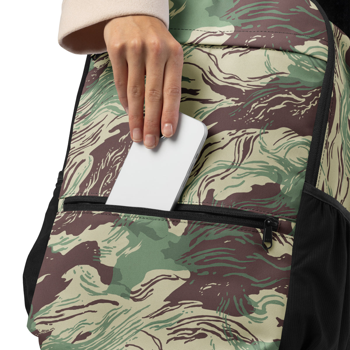 Camouflage-patterned bag with a hand holding a white card