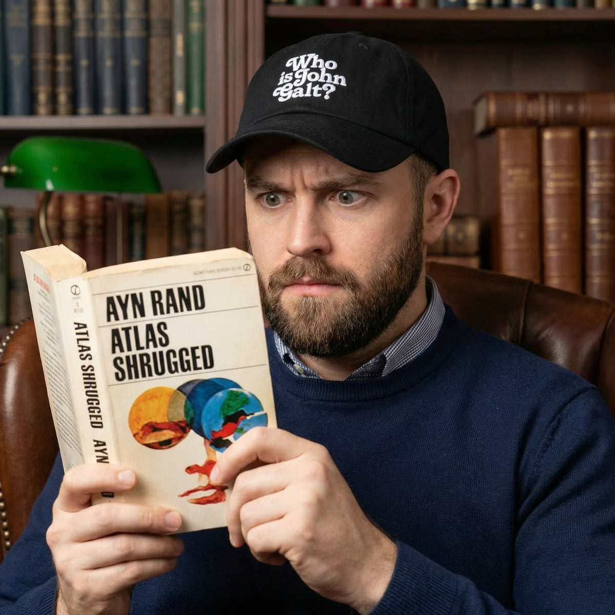 Man holding 'Atlas Shrugged' book with bookshelf background