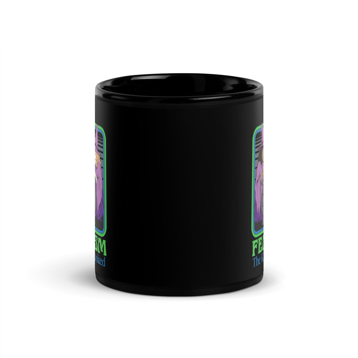 Black mug featuring a colorful “Feminism: The Kids Are Cooked” design with three witches around a green cauldron and a nervous child inside.