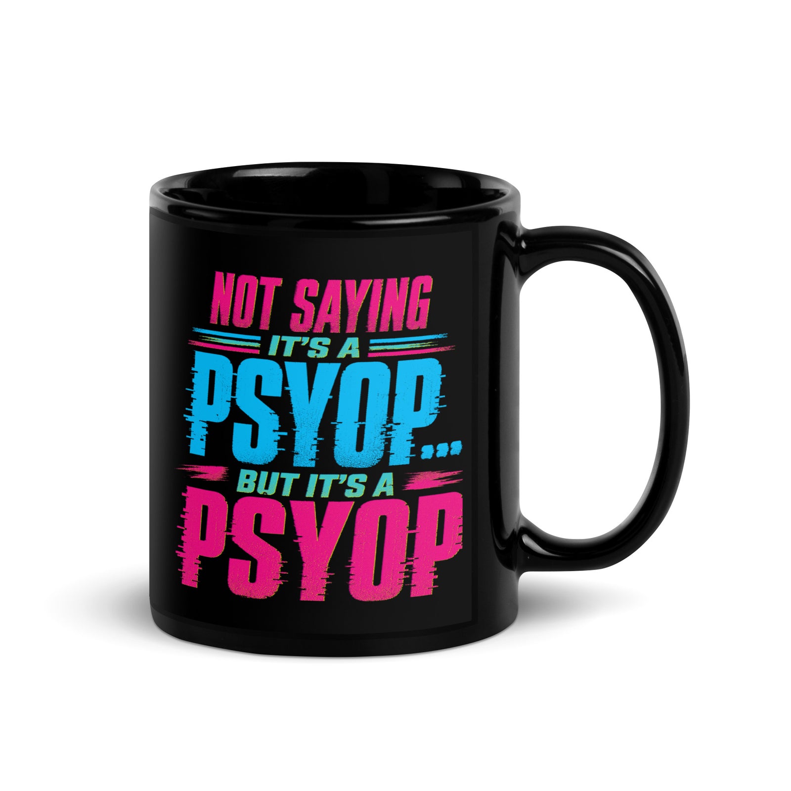 Black mug with colorful text on a wooden surface