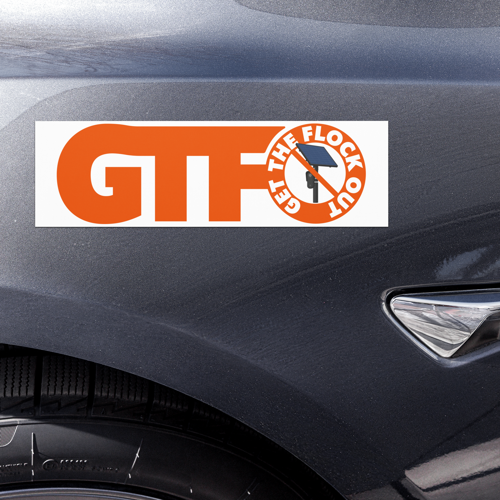 Get the Flock Out anti-surveillance car magnet with crossed-out Flock camera graphic