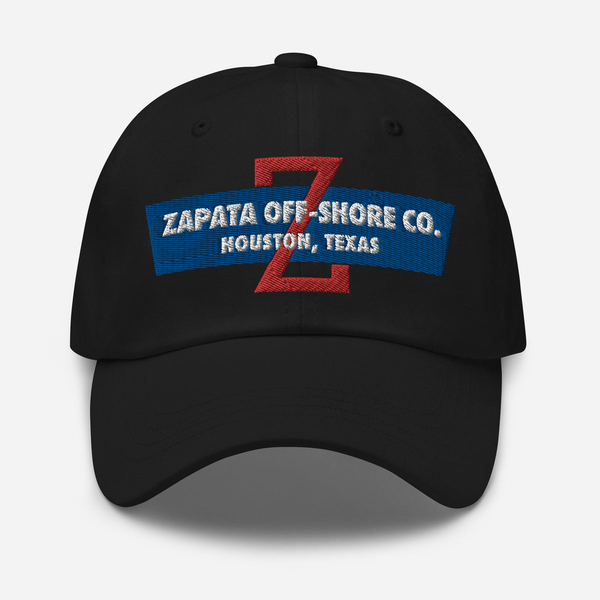 A black baseball cap with &#39;ZAPATA OFF-SHORE CO. HOUSTON, TEXAS&#39; embroidered in red and blue on the front.