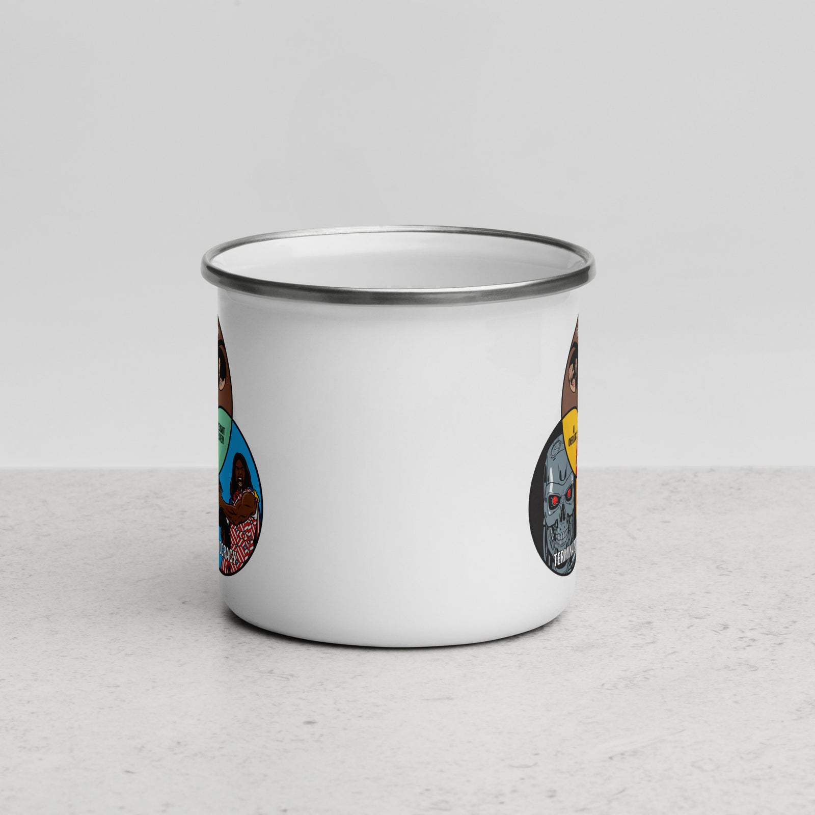 A white enamel campfire mug with a silver metal rim, featuring a colorful Venn diagram graphic on the side combining Terminator, The Matrix, and Idiocracy character illustrations.