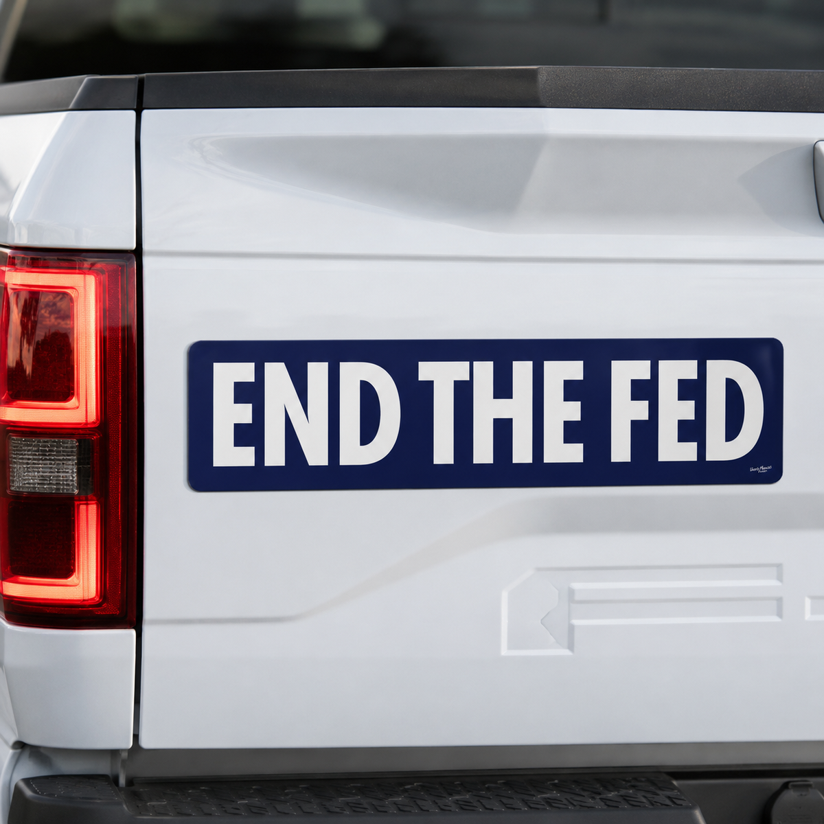 End the Fed 15 Inch Jumbo Bumper Sticker on a white pickup truck tailgate