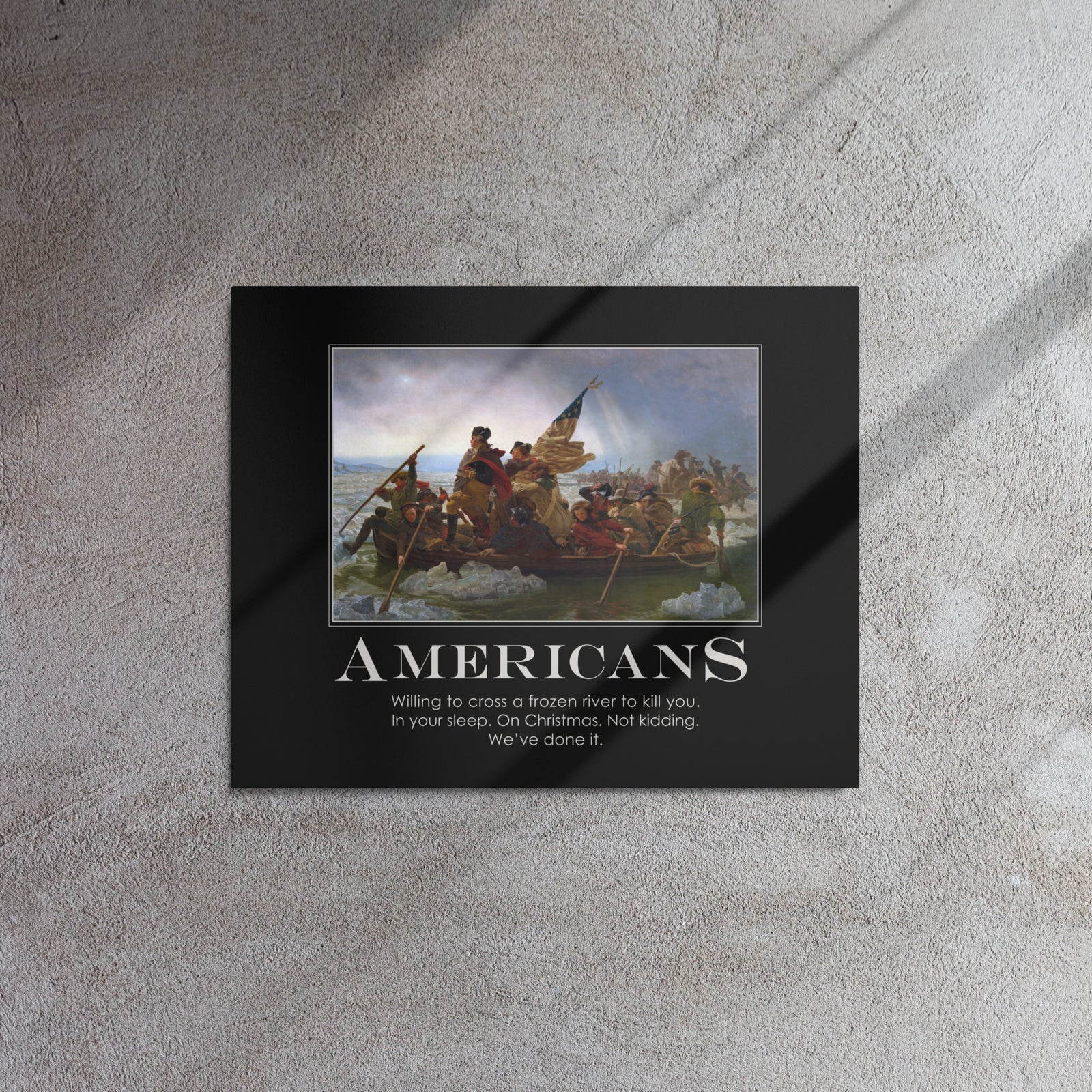 Framed artwork with a historical scene and text on a textured wall. 