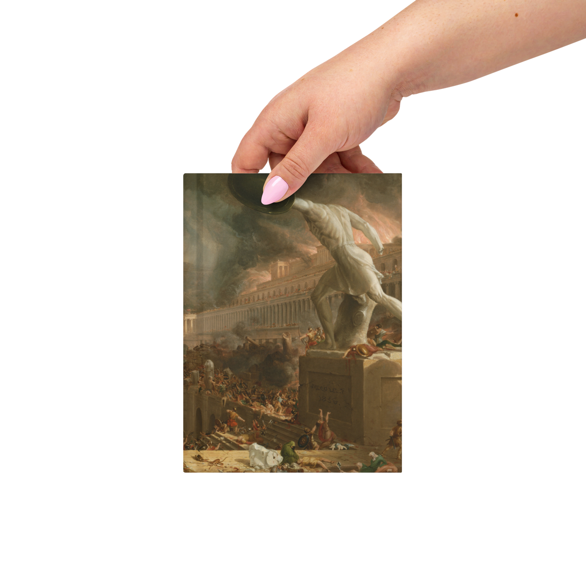 Hand holding a square print of a classical painting with a white dog and people in a historical setting.