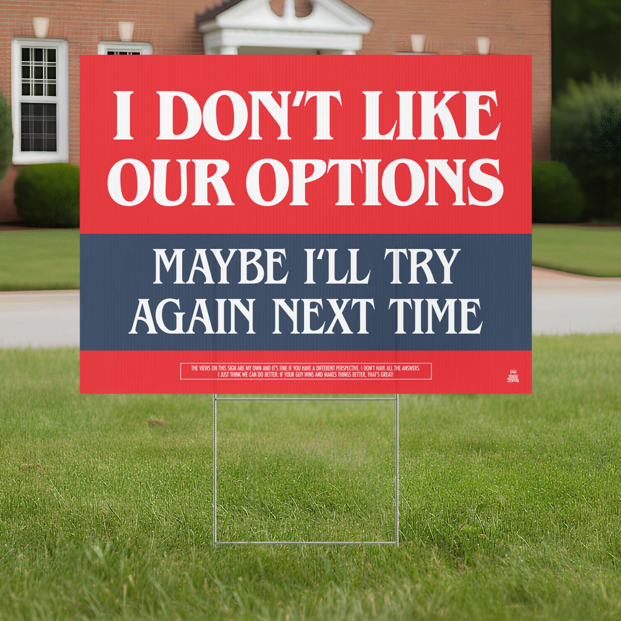 Yard sign reading: I Don’t Like Our Options – Maybe I’ll Try Again Next Time in red, white, and blue.