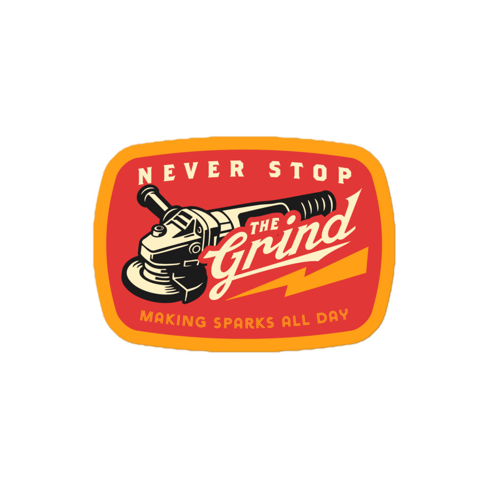 A square-shaped sticker with rounded corners featuring a red and orange background, a black and white angle grinder illustration, and the text 'NEVER STOP THE Grind MAKING SPARKS ALL DAY' on a plain white background.