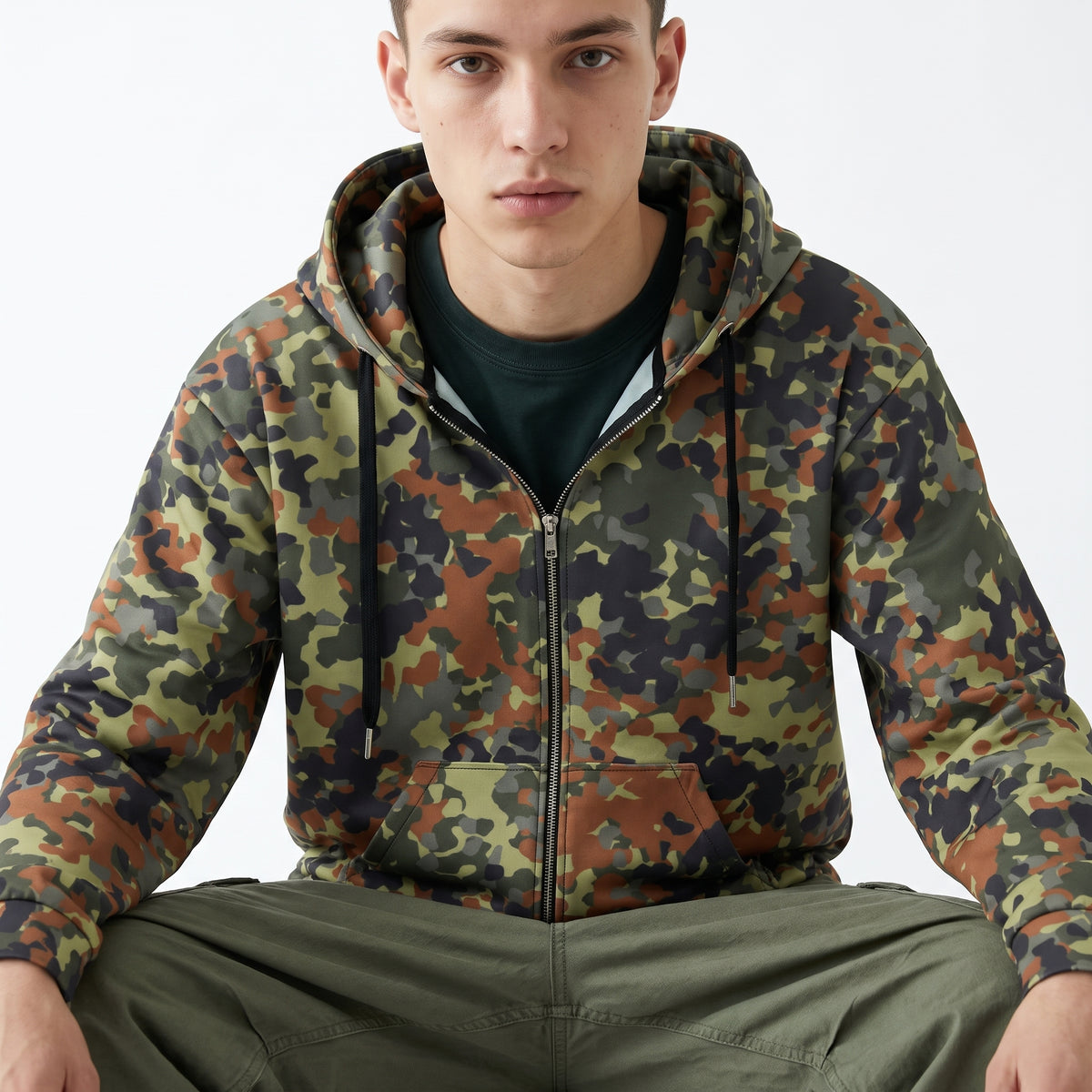 Flecktarn Reconnaissance camo zip hoodie worn by a male model, front detail
