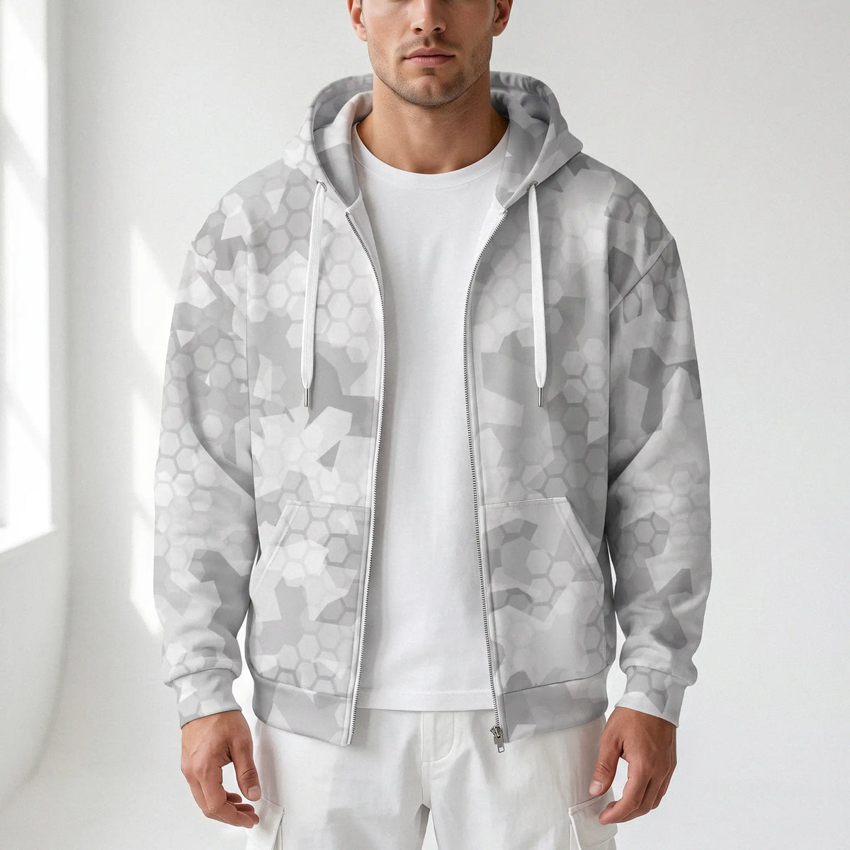 Man wearing the Arctic Shatter Camo Zip Hoodie