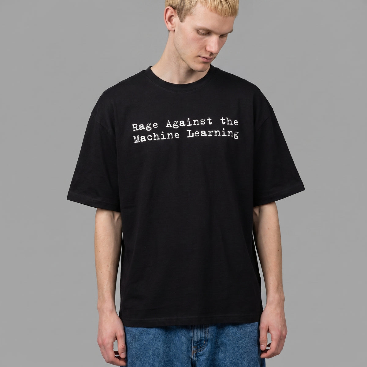Man wearing the Rage Against the Machine Learning oversized black tee