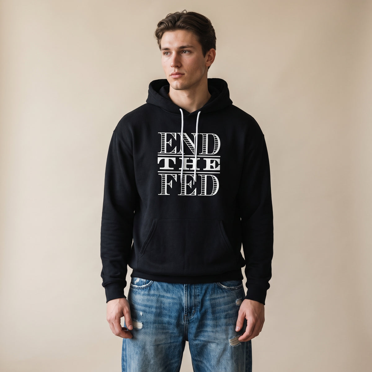 Male model in an End the Fed Unisex Pullover Hoodie by Liberty Maniacs
