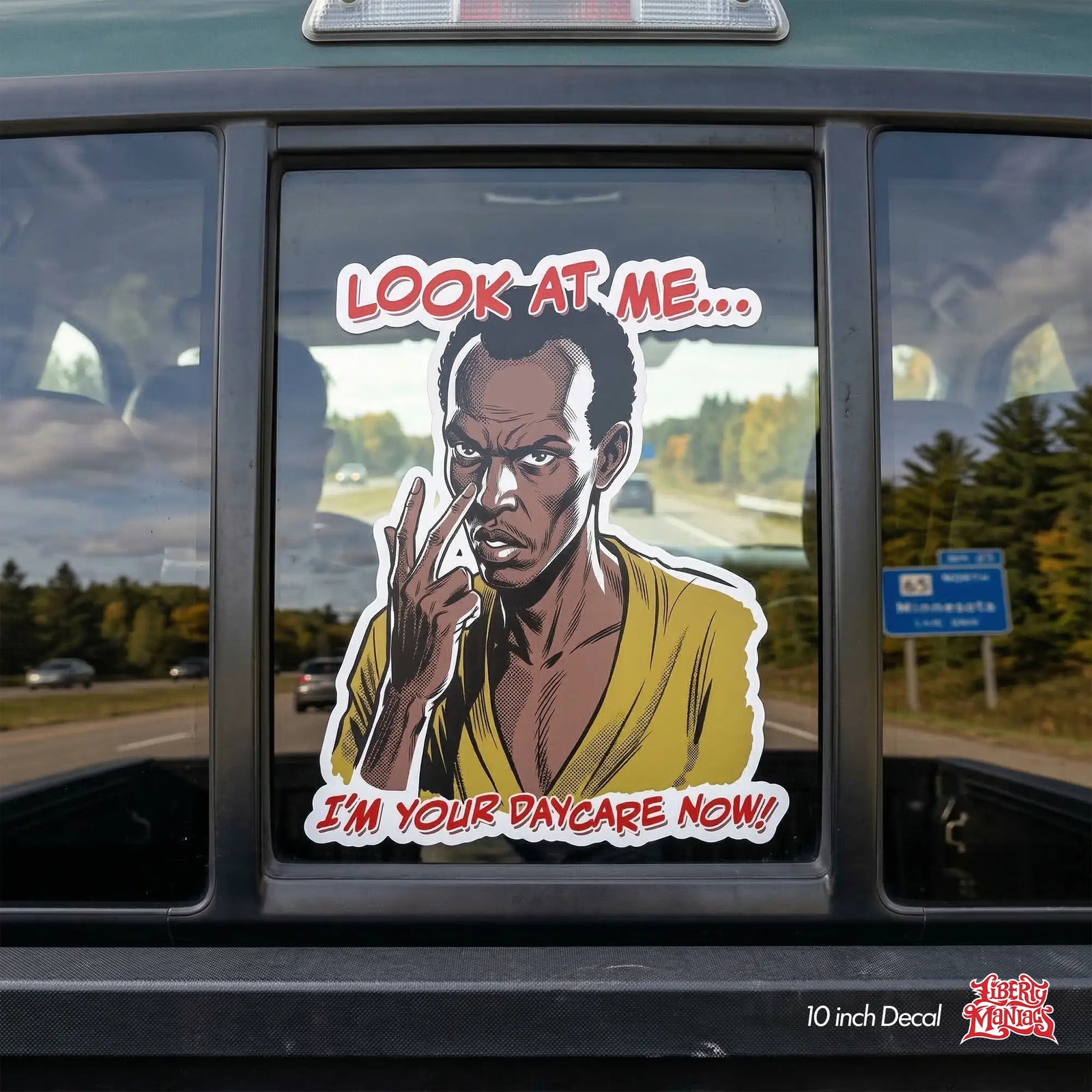 Sticker of a Somalian pirate saying "Look at me. I'm your Daycare now" on a back cab window for a pickup truck.