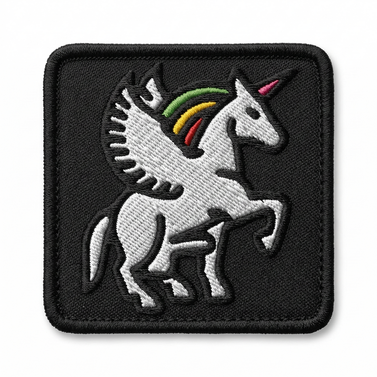 Embroidered patch with a unicorn design on a black background