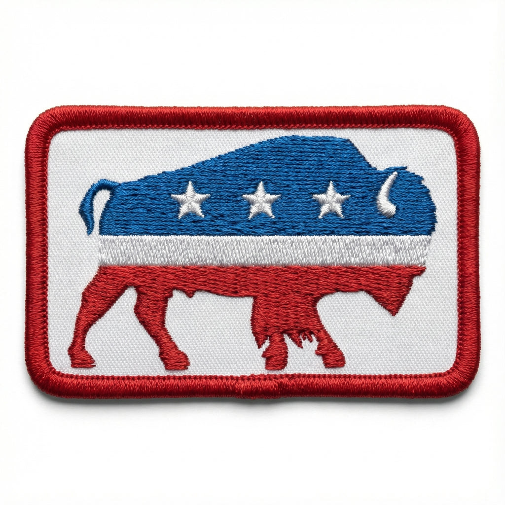 Embroidered patch with a blue, white, and red design featuring a buffalo silhouette on a white background.