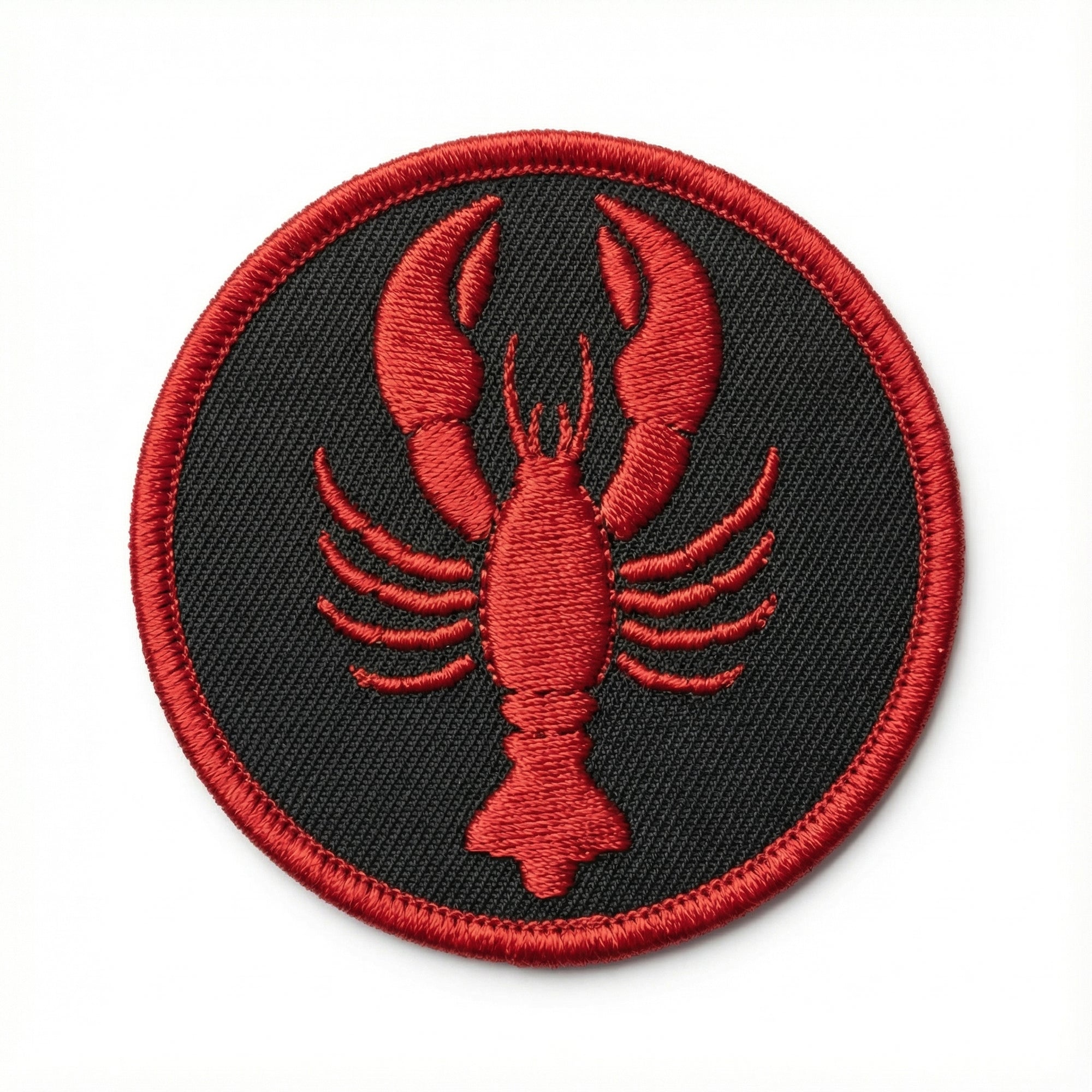 Red lobster patch on a black background
