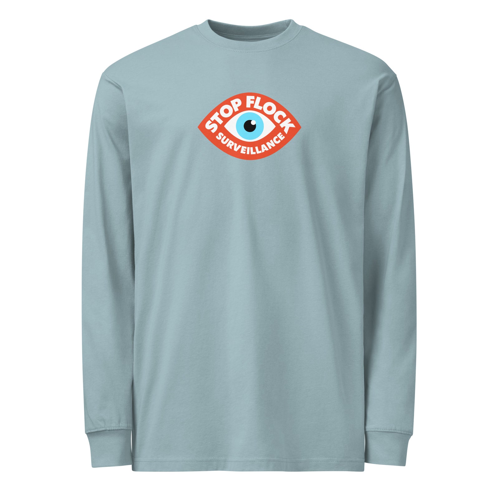 A light blue long-sleeve crewneck t-shirt with a red and blue 'Stop Flock Surveillance' graphic printed on the chest, displayed on a clean white background.