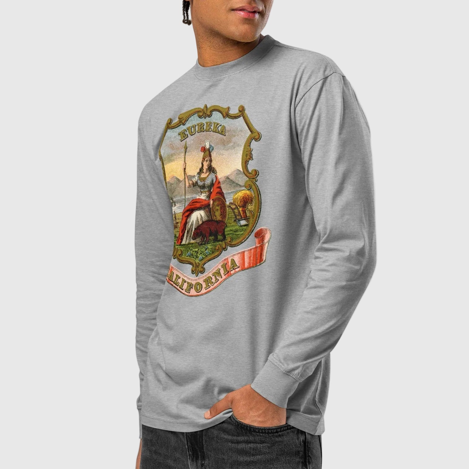 Angled view of a man wearing the Carbon Grey California State Seal heavyweight long sleeve T-shirt.