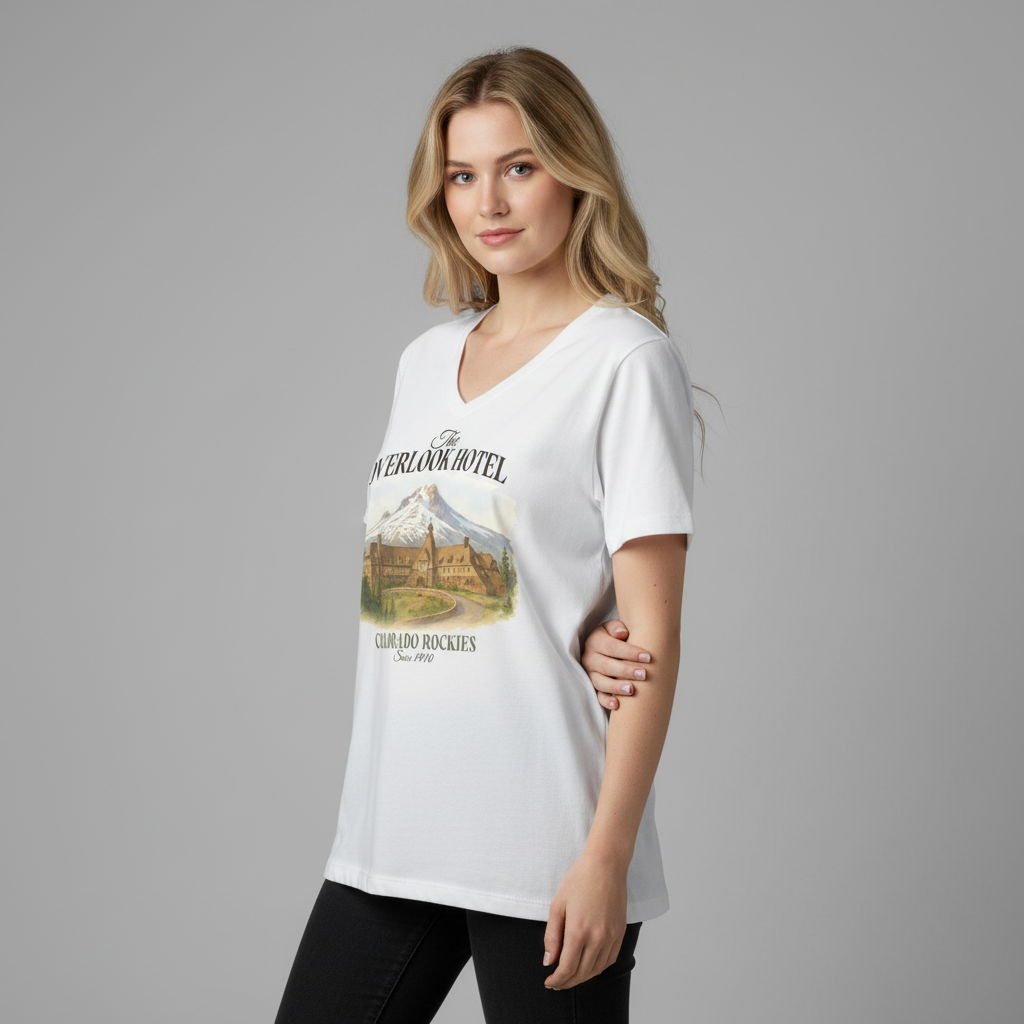 Woman wearing a white t-shirt with a graphic design on a gray background