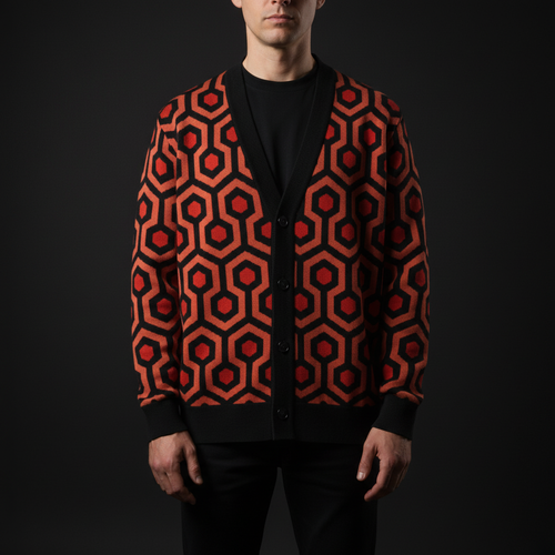 Overlook Knit Cardigan, red and orange horror carpet pattern sweater on model against black background