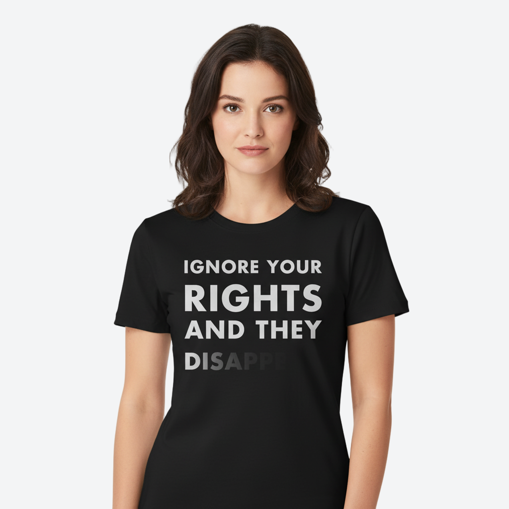 Person wearing a black t-shirt with text on a white background