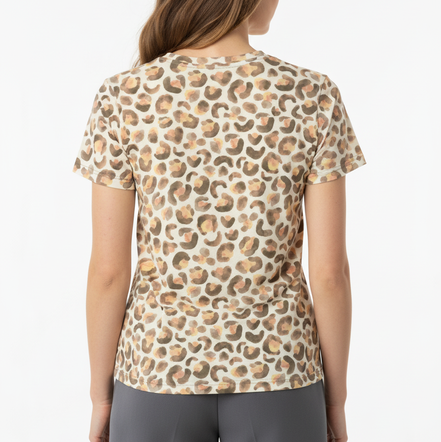Woman wearing a leopard print shirt on a white background