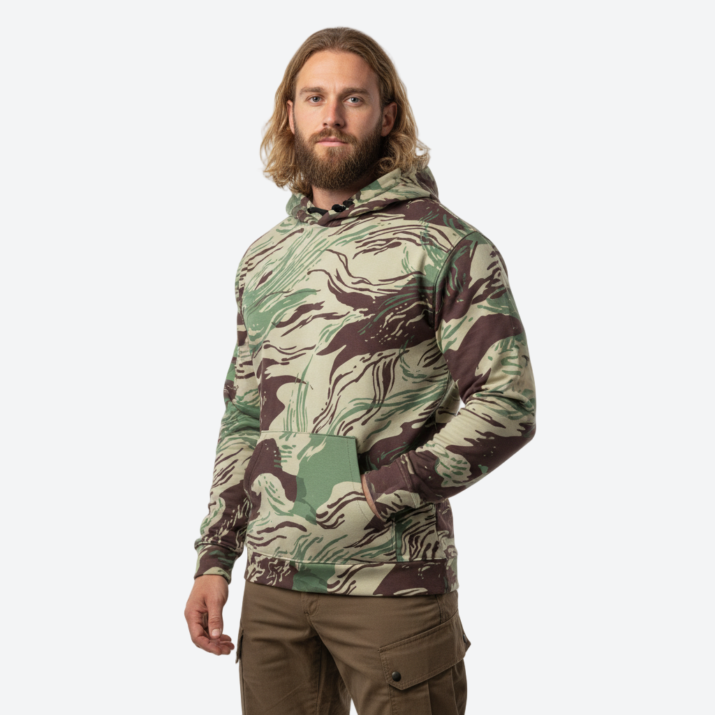 Man wearing a Rhodesian Brushstroke Camo Cotton Hoodie on a white background