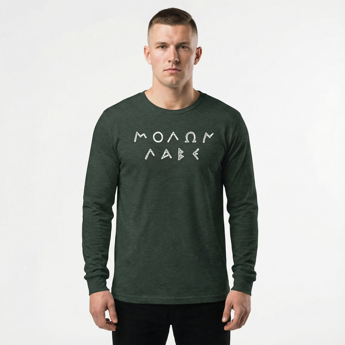 Man wearing a green long-sleeve shirt with white text on a white background