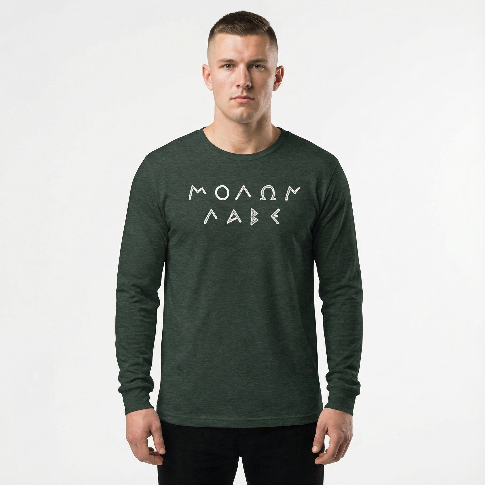 Man wearing a green long-sleeve shirt with white text on a white background