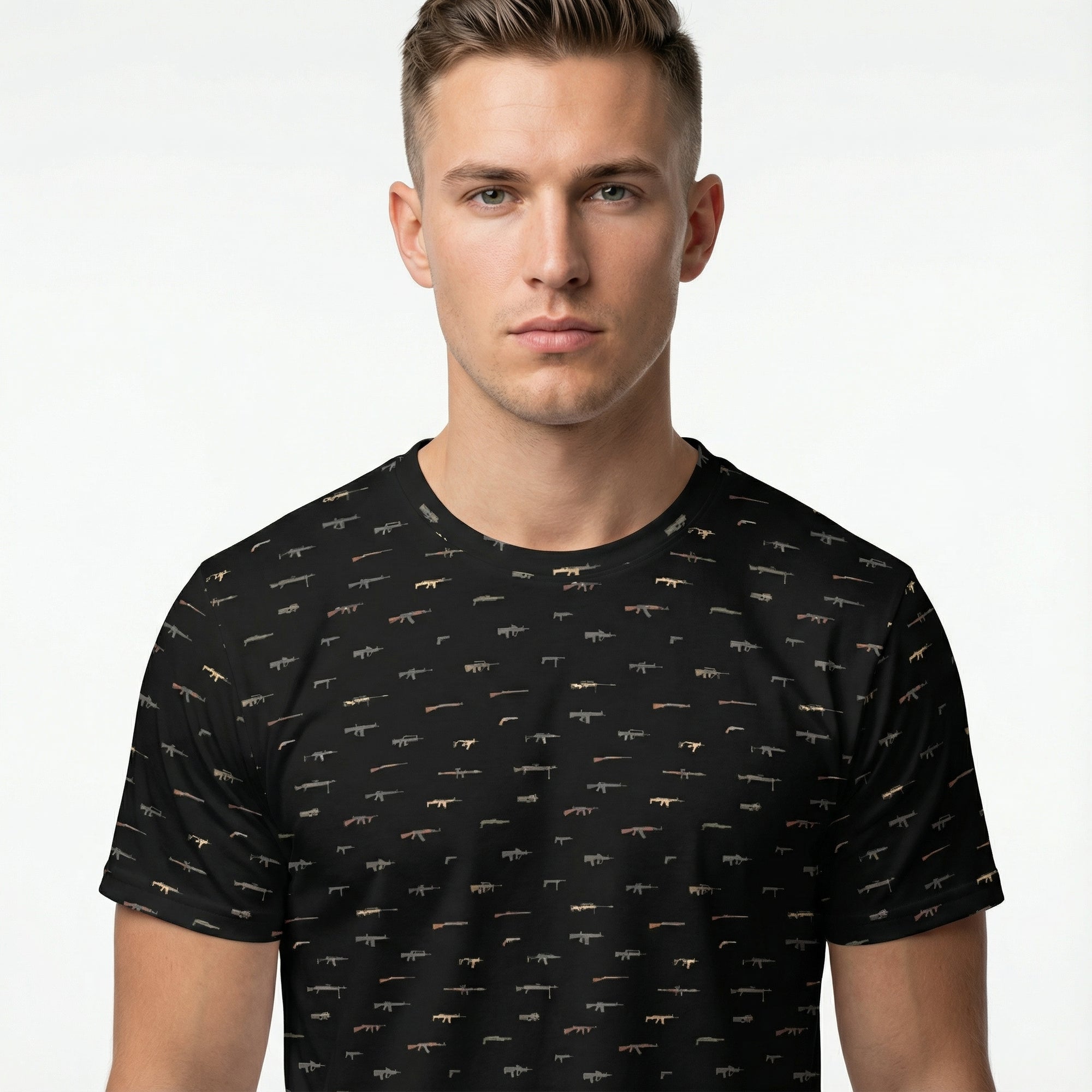 Man wearing a black t-shirt with small patterns on a white background