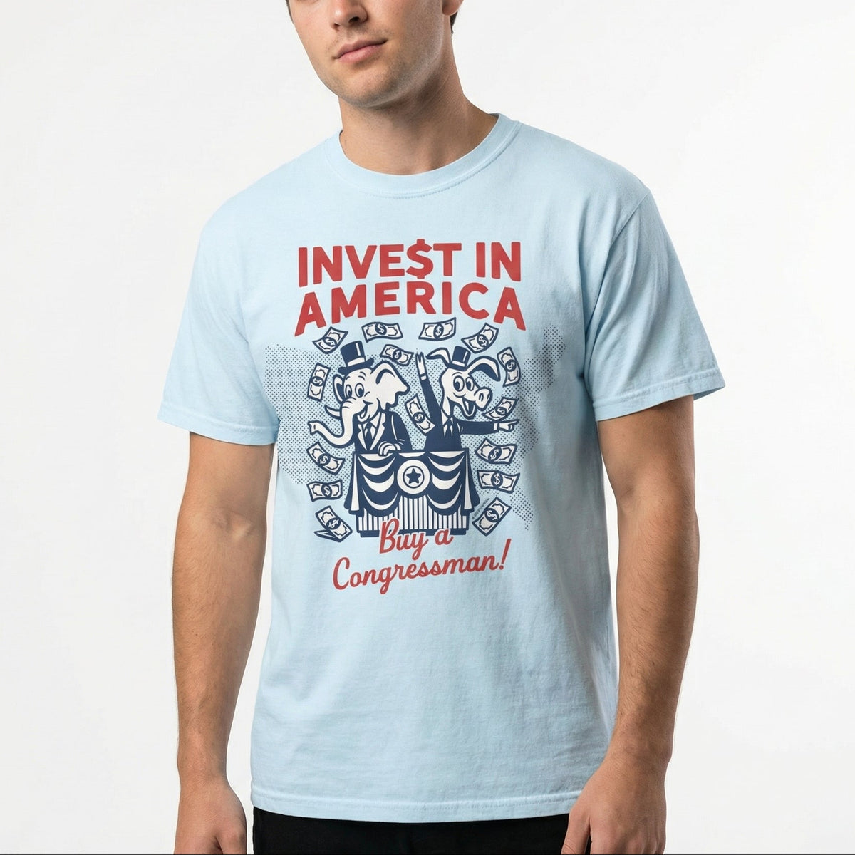 Man wearing a light blue t-shirt with &#39;Invest in America&#39; and &#39;Buy a Congressman!&#39; text on a white background