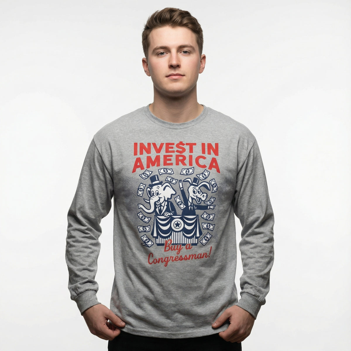 Model wearing the Invest in America Buy a Congressman long sleeve shirt showing retro political mascots and flying money graphic.