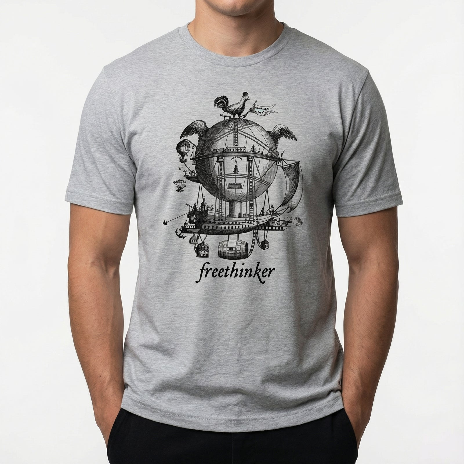 Gray t-shirt with a black graphic design and the word 'freethinker' on a white background