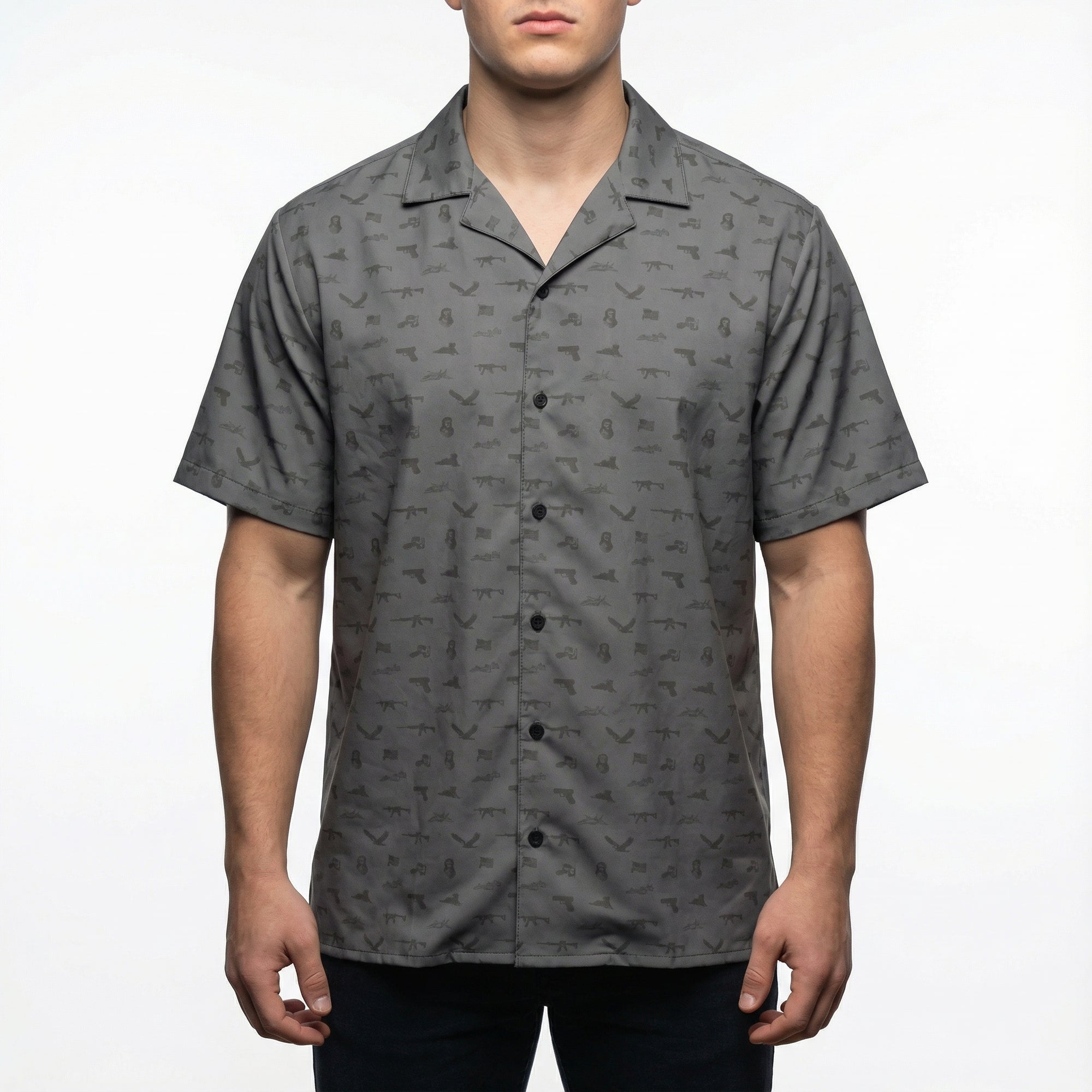 Man wearing a gray patterned short-sleeve shirt on a white background