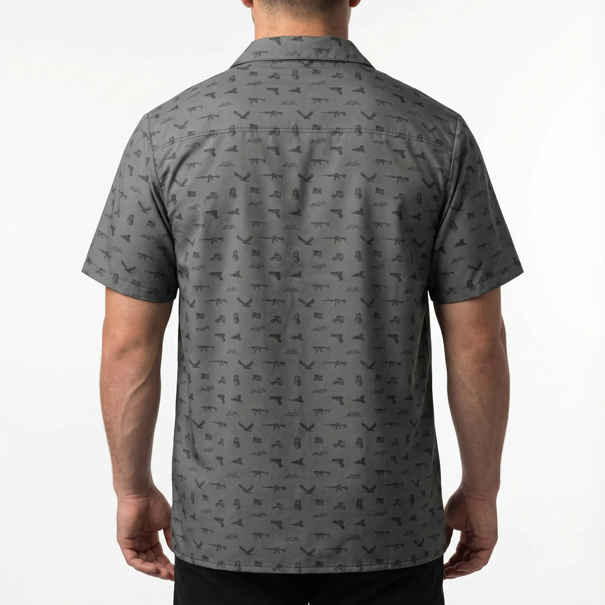 Man wearing a gray patterned shirt on a white background