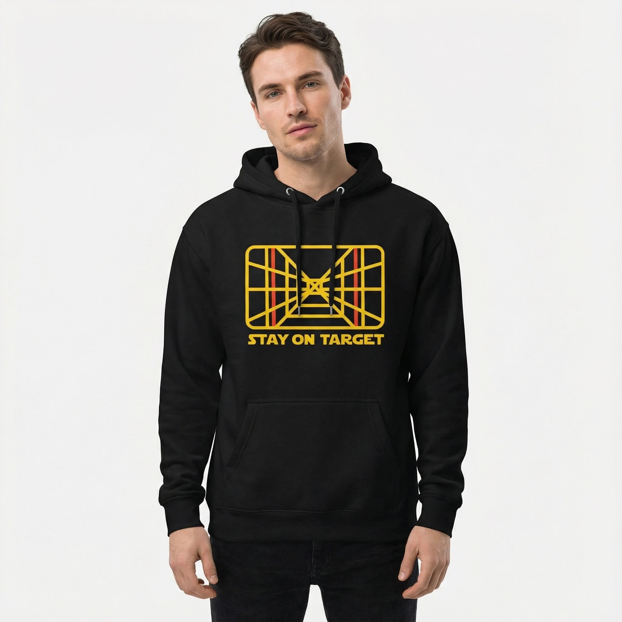 Person wearing a black hoodie with a yellow graphic and text on a white background