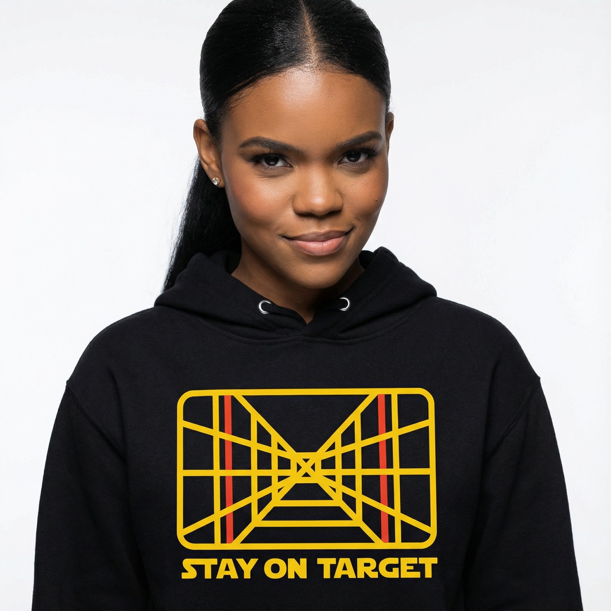 Person wearing a black hoodie with a geometric design and 'Stay on Target' text.