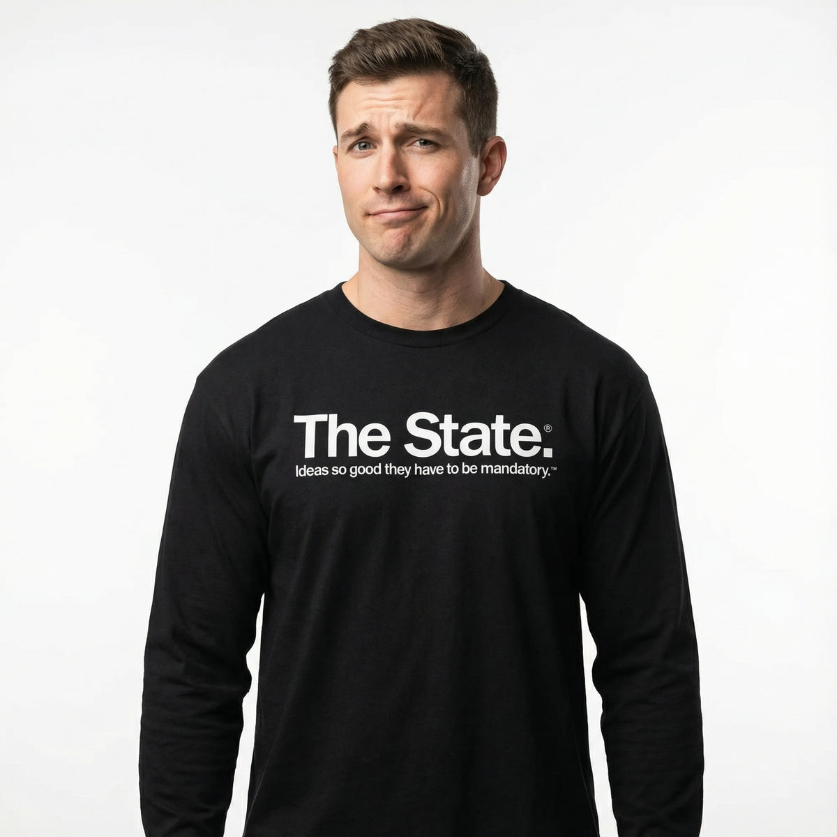 Man wearing a black long-sleeve shirt with 'The State' text on a white background