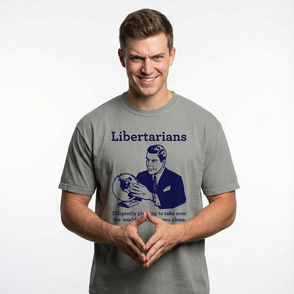 Man wearing a t-shirt with a graphic and text, standing against a plain background