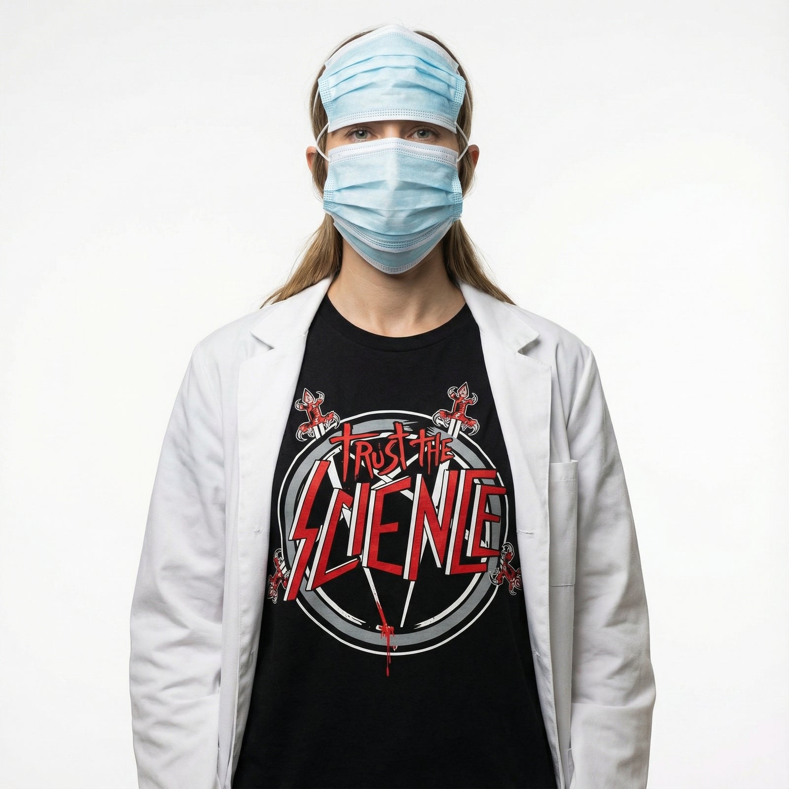 Person wearing a black t-shirt with 'Trust the Science' graphic, white lab coat, and blue face masks on a white background.