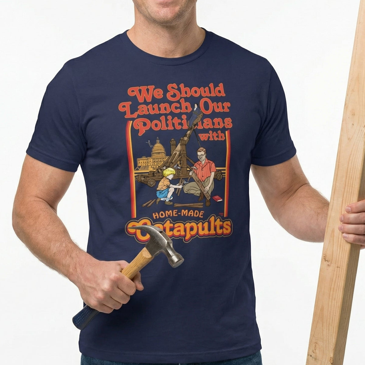 Man wearing a t-shirt with a humorous design, holding a wooden plank and hammer.