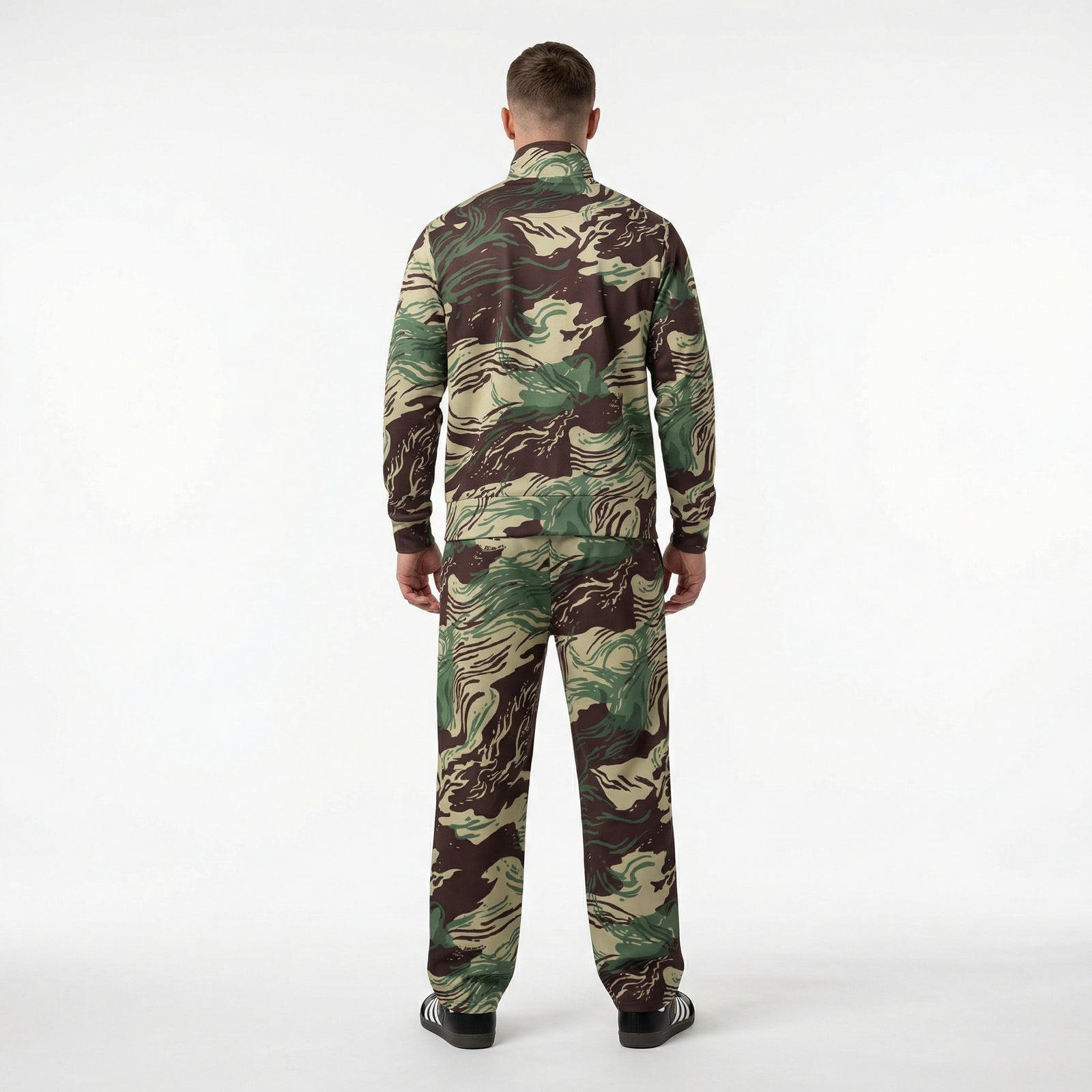 Person wearing a camouflage jumpsuit on a white background