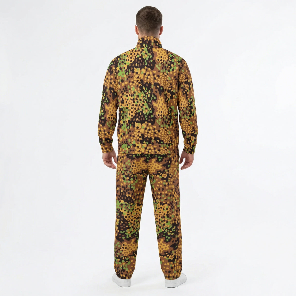 Person wearing a camouflage outfit on a white background