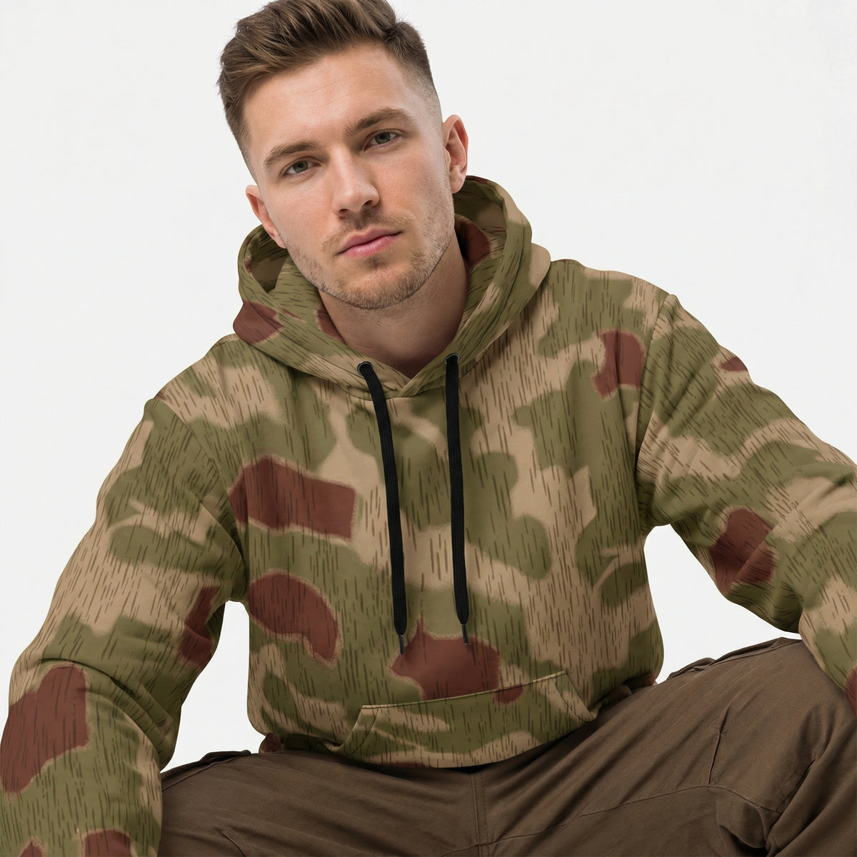 Man wearing a Sumpftarnmuster Camouflage Cotton Hoodie on a white background