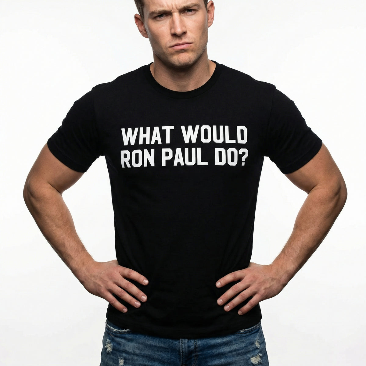 Man wearing a black t-shirt with 'What Would Ron Paul Do?' text on a plain background