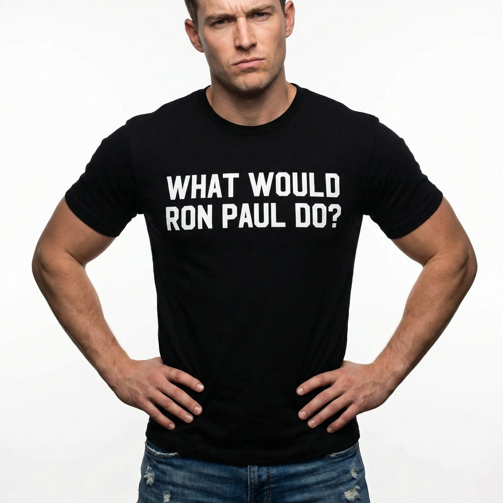 Man wearing a black t-shirt with 'What Would Ron Paul Do?' text on a plain background