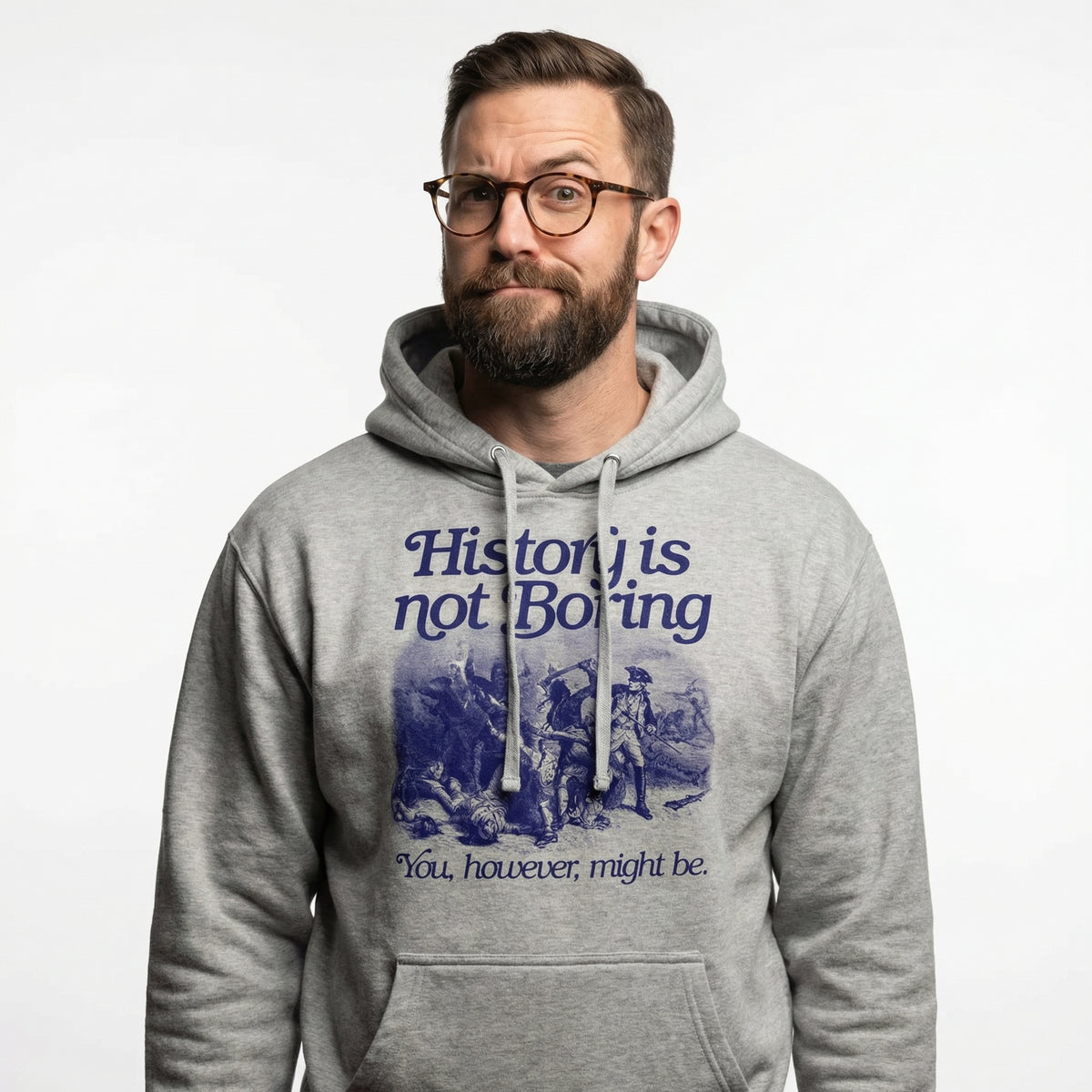 Man wearing a gray hoodie with a historical design and text on a white background