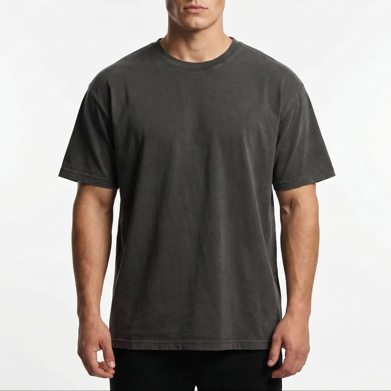 Front view of black garment-dyed t-shirt with relaxed fit and clean, minimal design