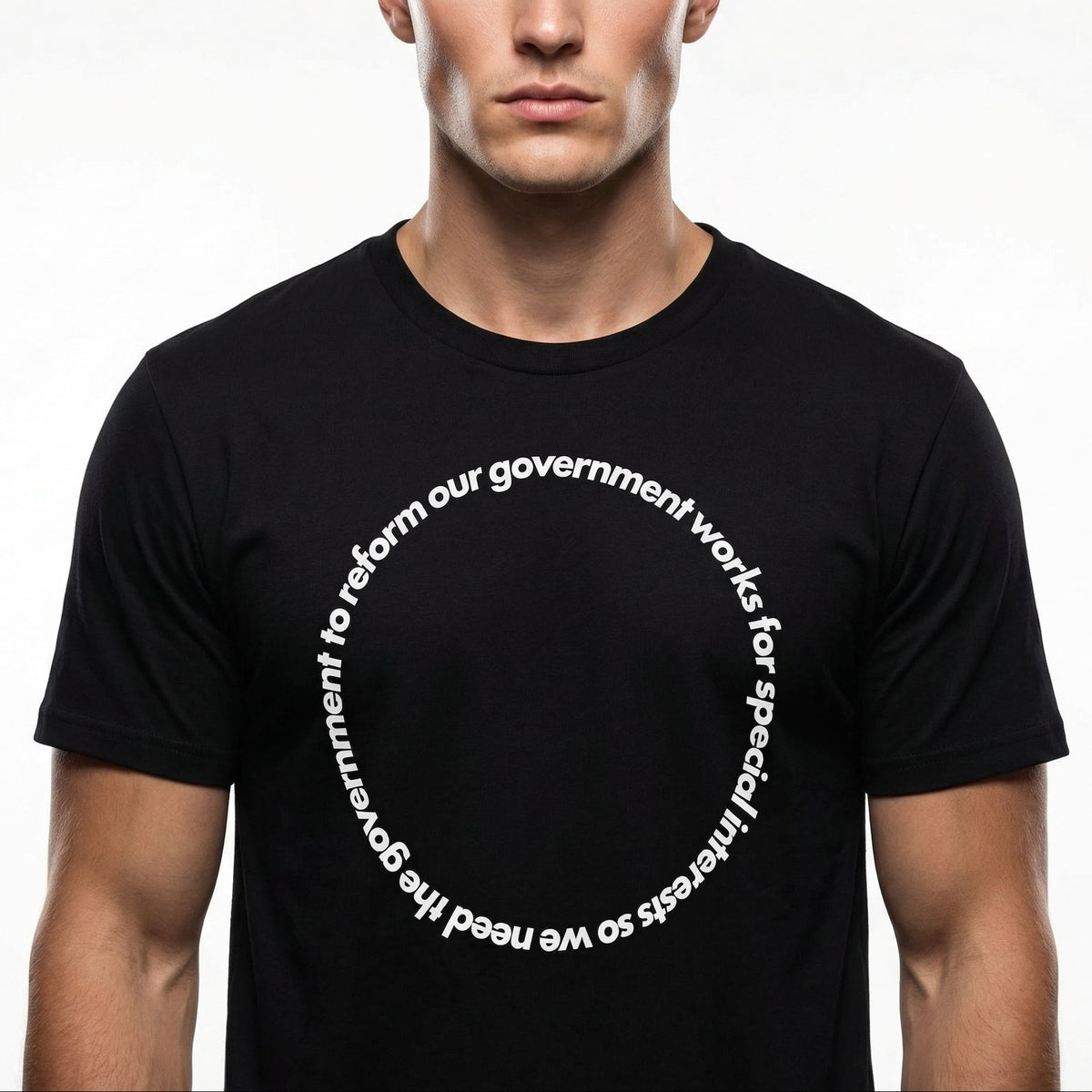 Man wearing a black t-shirt with white text on a plain background